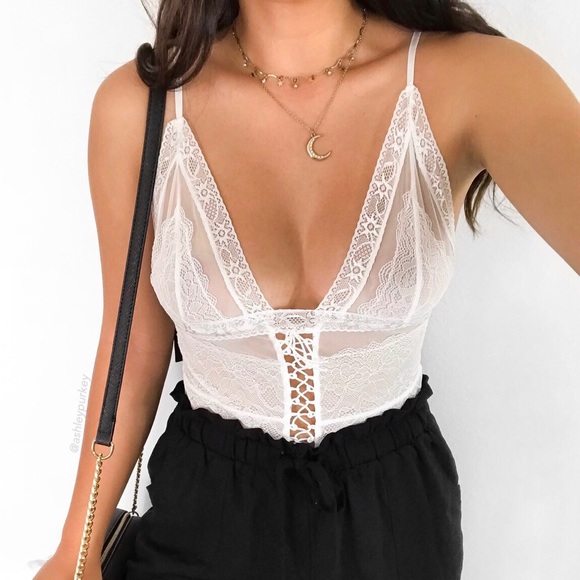 Daisys Boutique Tops - ❤️SALE❤️ delicate white lace mesh lace up bodysuit